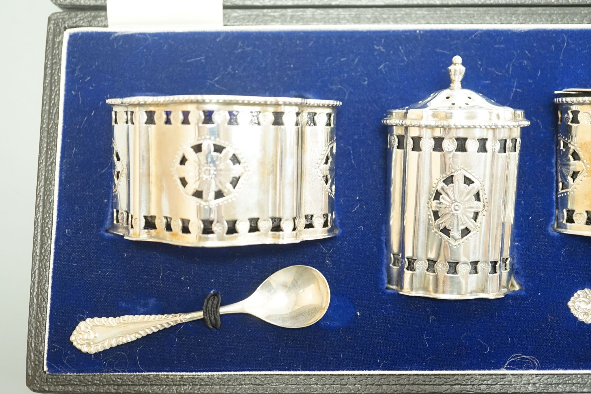 A modern cased three piece silver condiment set, by A. Chick & Sons Ltd, London, 1971.